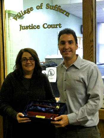 Former Suffern Mayor Dagan Lacorte (left) hands off the gavel of village leadership to incoming Mayor Trish Abato. Photo credit: Dagan Lacorte Facebook.