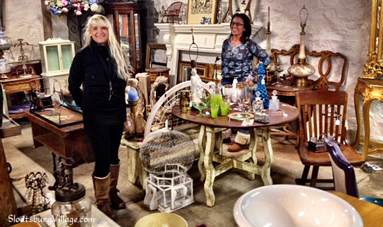 Debby Antonelli and Alison Rose, who operate the popular antique store The Garage, downstairs at BackHome Antiques.